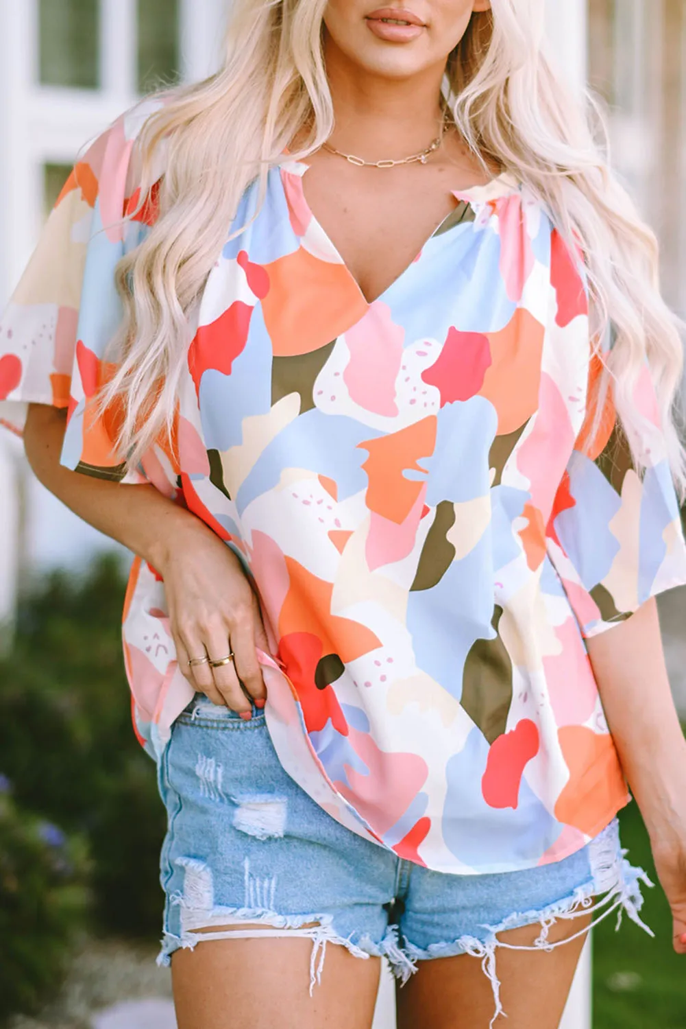 Abstract Short Sleeve V-Neck Blouse